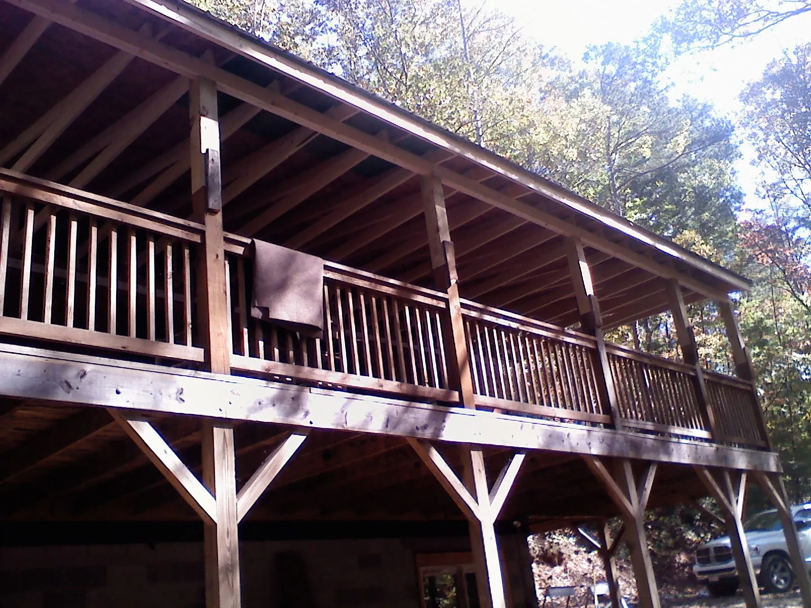 Timber framing under a new elevated porch and deck — Roof Leak Repair in Big Lake by Roofing Brothers